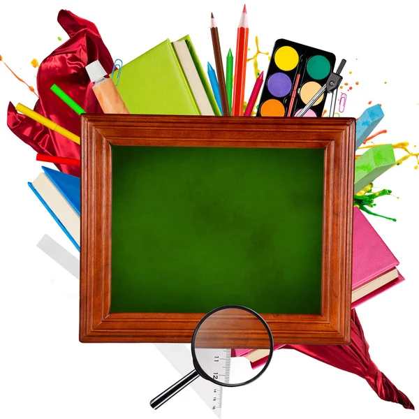 Wooden blackboard with school supplies — Stock Photo, Image