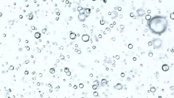 Flytta bubblor på vit bakgrund — Stockfoto