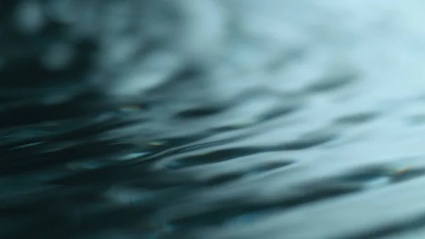 Blue water surface background, studio shot — Stock Photo, Image