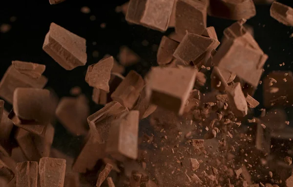 Freeze Motion Shot of Exploding Chocolate Chunks — Fotografia de Stock