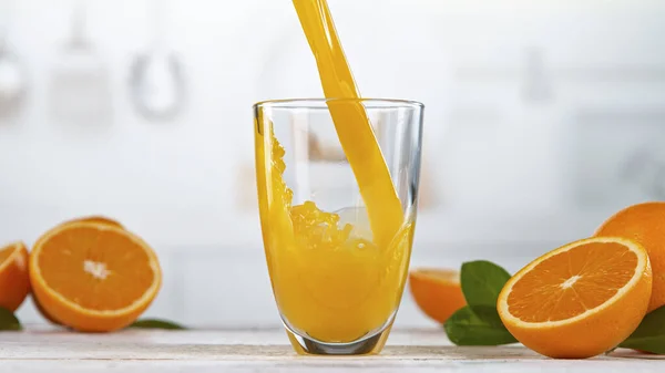 Fresh Orange Juice Being Poured in a Glass — Stock Photo, Image