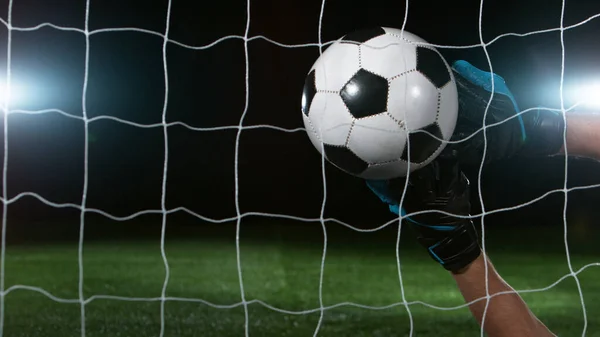 Goalkeeper catches soccer ball, close up. — Stock Photo, Image