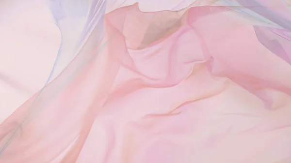 Tela de seda transparente color pastel que fluye por el viento — Foto de Stock