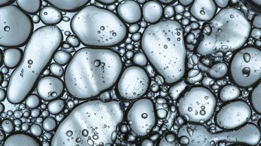 Işık Arkaplanındaki kabarcıklar taşınıyor, makro çekim.