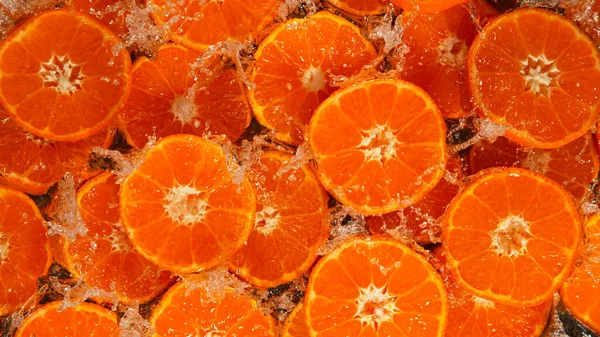 Freeze Motion Shot Splashing Fresh Tangerines Close — Fotografia de Stock