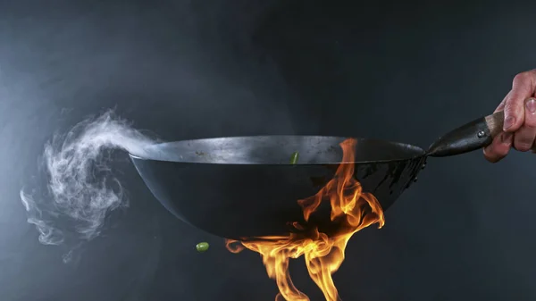 Freeze Motion Wok Pan Flying Ingredients Air Fire Flames — Foto de Stock