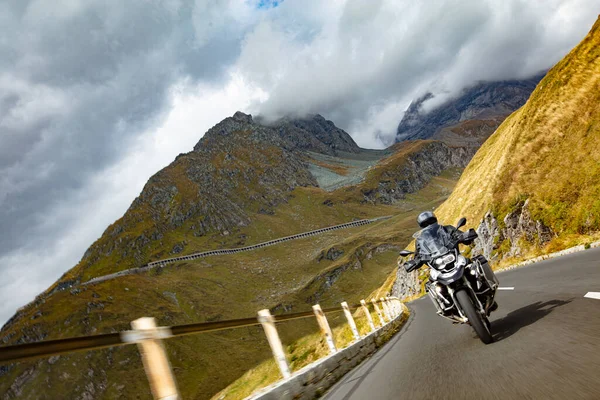 Motorbiker Riding Austrian Alps Dramatic Sky Travel Freedom Outdoor Activities — Stock Photo, Image