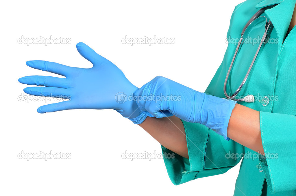 Doctor puts on gloves