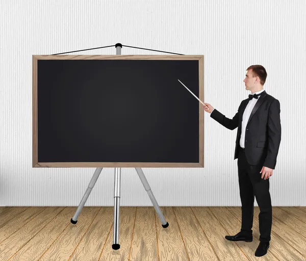 Man wijzen op blackboard — Stockfoto