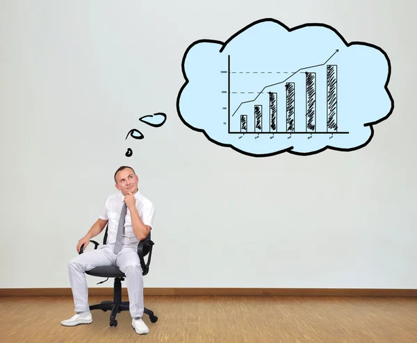 Man sitting on chair — Stock Photo, Image