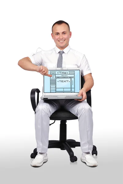 Mann und Laptop mit Vorlage Webseite — Stockfoto