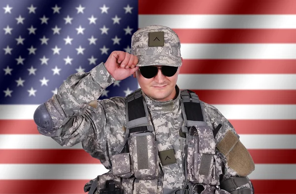 Voják a vlajky — Stock fotografie
