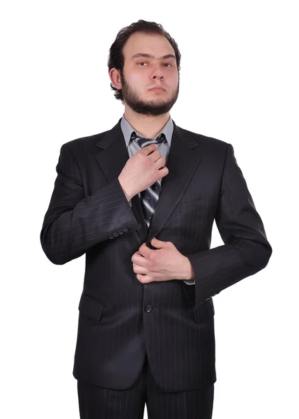 Empresario ajusta su corbata — Foto de Stock