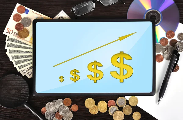 Tablet com gráfico dólar — Fotografia de Stock