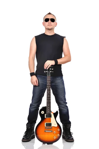 Rocker holding guitar — Stock Photo, Image