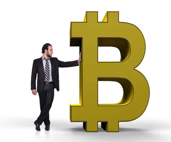 Hombre de negocios sosteniendo bitcoin —  Fotos de Stock