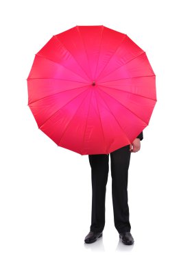 açık bir şemsiye ile işadamı