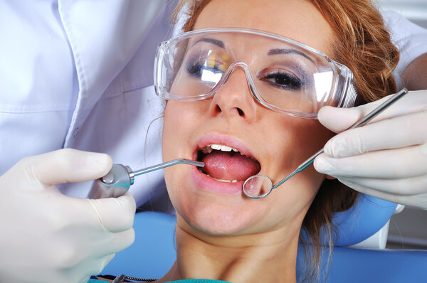 dentist treats teeth