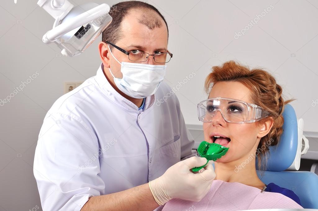 Dentist makes an impression — Stock Photo © vetkit 40953853