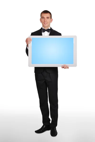 Businessman holding plasma — Stock Photo, Image