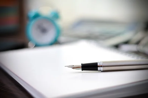 Pen and  notebook — Stock Photo, Image