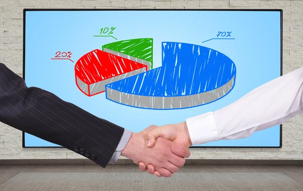 Handshake and  chart — Stock Photo, Image