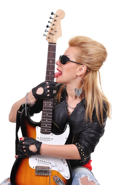 Girl licking guitar — Stock Photo, Image