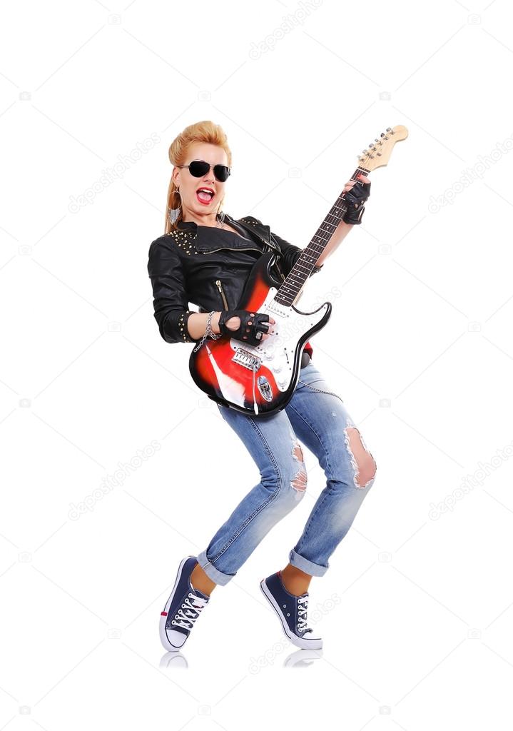 girl playing on guitar