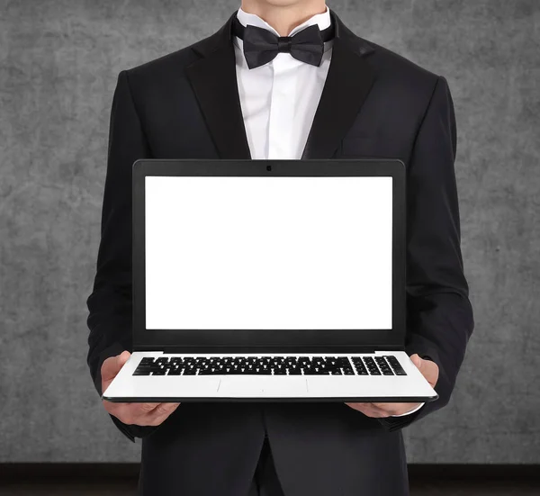 Businessman Holding Laptop Blank Screen Monitor Global Business Technology Concept — Foto Stock