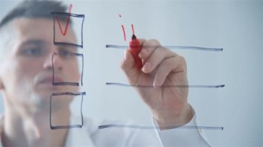 Businessman Writing Checklist On Transparent Screen. Business And Social Media Concept.