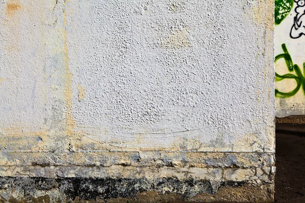 Textura de una vieja pared abandonada de gris — Foto de Stock