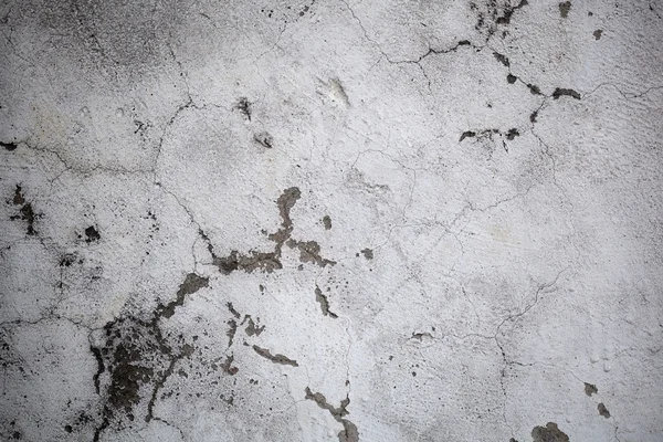 Il muro di cemento grigio nelle fessure Astratto, primo piano — Foto Stock