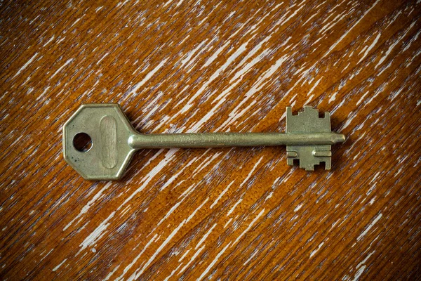Der Schlüssel ist auf dem Brett, Vintage-Stil. — Stockfoto