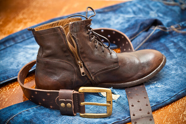 Fashionable leather shoes, leather belt and jeans