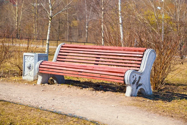 Wooden bench in the park on the street — Stock Photo, Image