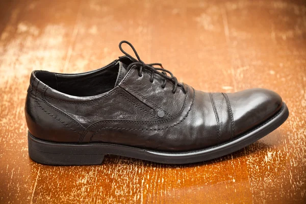 Classic leather shoes black color close up — Stock Photo, Image