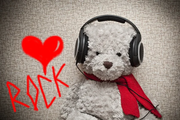 A fan of rock music in headphones — Stock Photo, Image