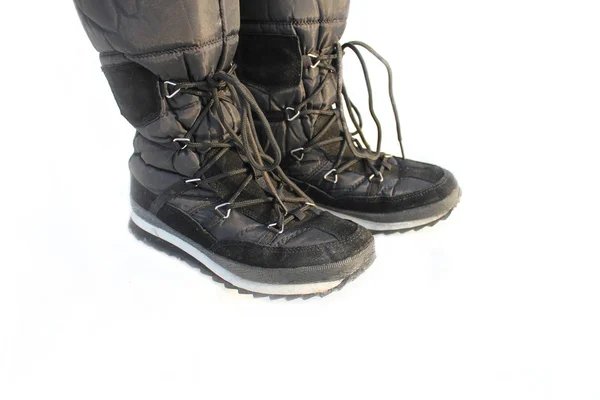 Une paire de bottes de neige sur fond blanc — Photo