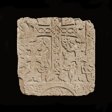 Armenian medieval cross stone on the peninsula Sevan isolated on black clipart