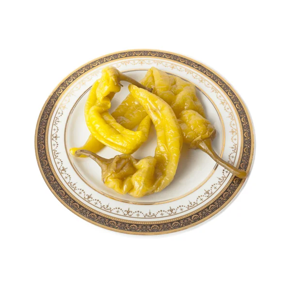 Pimientos en escabeche en un plato aislado sobre blanco — Foto de Stock