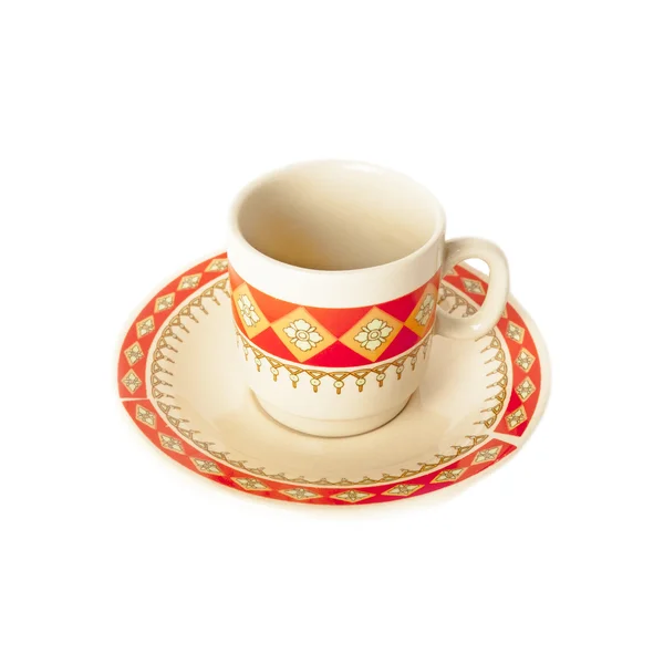 Koffie kop en schotel uit klei met etnische patroon geïsoleerd over Wit — Stockfoto