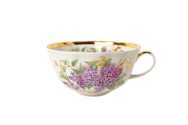 Tazza da tè in porcellana con ornamento floreale isolato su bianco — Foto Stock