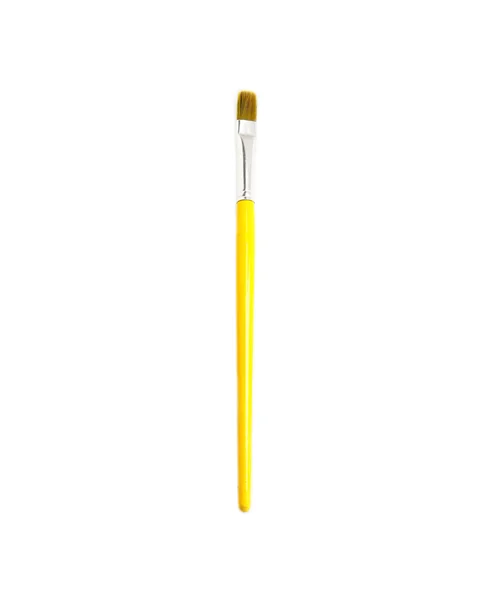 Pincel de pintura amarelo de madeira isolado sobre branco — Fotografia de Stock