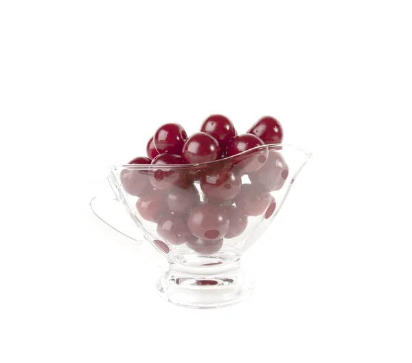 Red cherries in glass vase isolated on white background — Stock Photo, Image