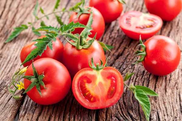 Tomatoes, cooked with herbs for the preservation — Stock Photo, Image