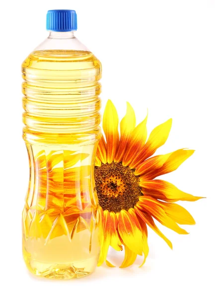 Cooking oil in a plastic bottle with sunflower. — Stock Photo, Image