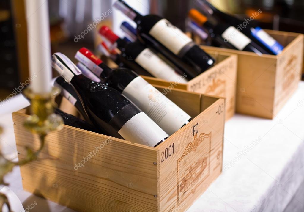 Wine bottles in wooden boxes.