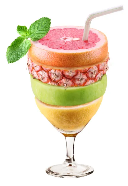 Glass of juice, consisting of layers of fruit. — Stock Photo, Image