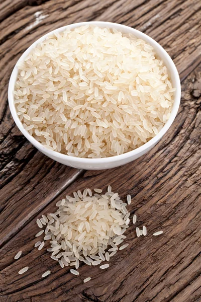 Uncooked rice in a bowl — Stock Photo, Image