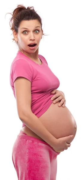 Happy pregnant woman keeping hands on her belly. — Stock Photo, Image